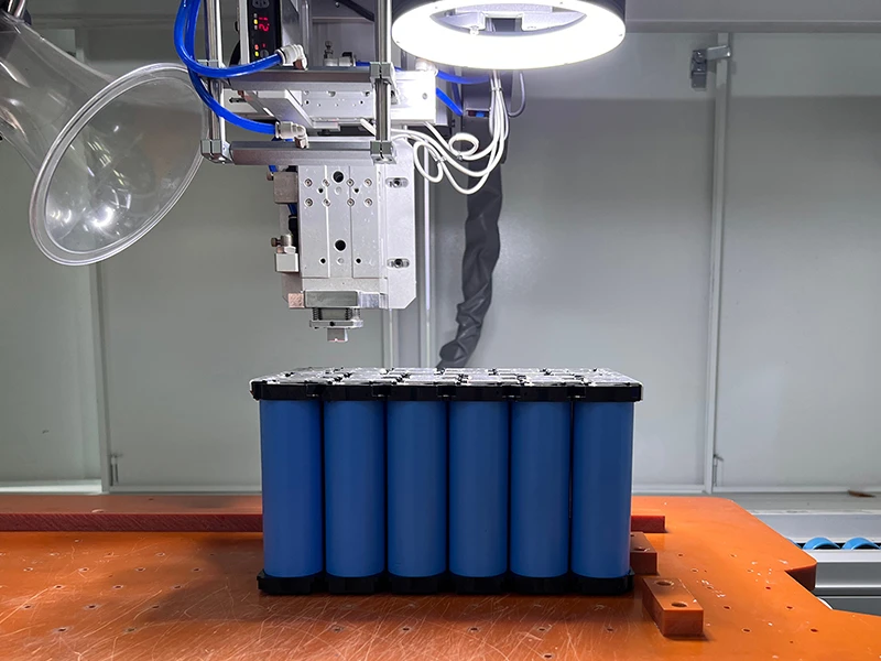 Greatech Energy automated equipment processing cylindrical lithium‑ion battery module during PACK manufacturing Greatech Energy automated equipment processing cylindrical lithium‑ion battery module during PACK manufacturing